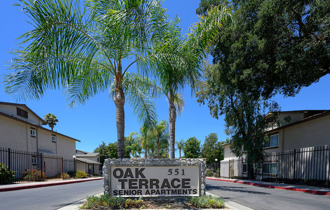 a sign that says oak terrace senior apartments at Oak Terrace Senior Apts, California