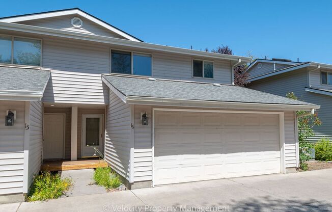 Move in Deposit Reduced! Beautiful Townhome with new paint, carpet and refinished hardwood floors!
