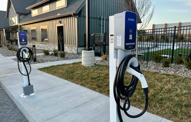 a charging station for electric vehicles outside of a house at The Depot, Raymore, Missouri