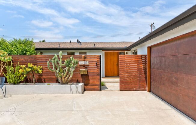 A Fully Furnished Modern Portfolio Home with a Large Backyard Oasis & 3 Comfortable Bedrooms!