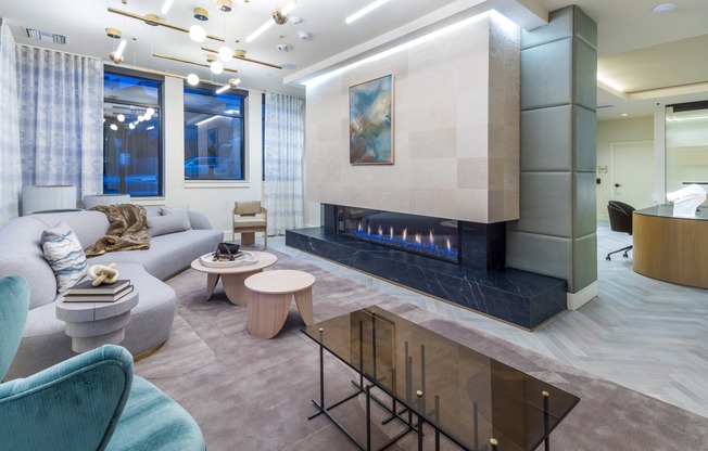 Lobby with sleek fireplace and plush seating areas