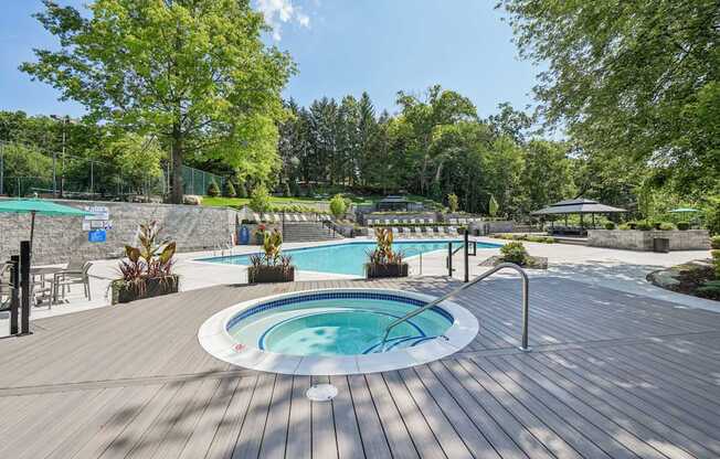 Newly remodeled pool area with a spa