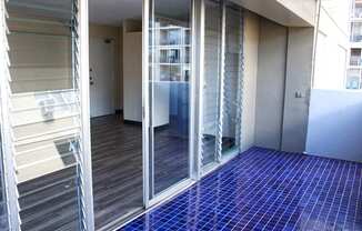 Waikiki Walina Apartments balcony with glass doors