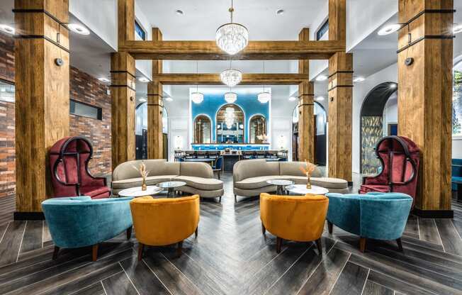 the lobby of a restaurant with tables and chairs and a bar at The Alibi at Lake Lilly, Ocoee, FL