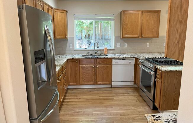 Spacious 4-Bedroom Home in Desirable Cedar Mill on Quiet Street with Fenced Yard & Attached Garage