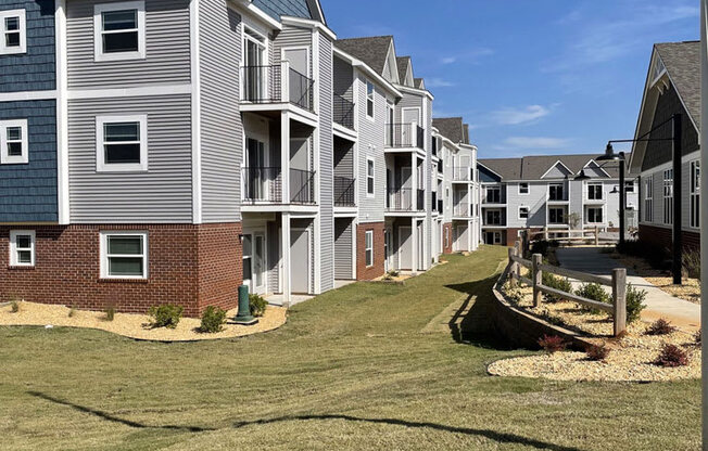 Rear Exterior Apartment Building at Chase Creek Apartment Homes in Huntsville, AL