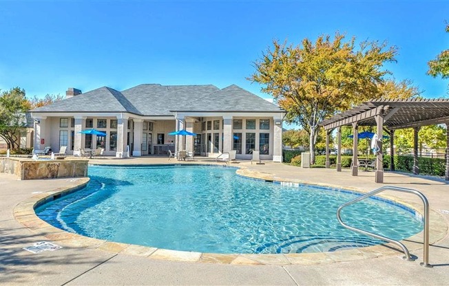 Resort-Inspired Pool with Waterfall.
