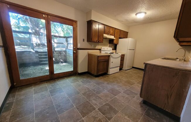 3 Bedroom bi-attached home with fenced yard!