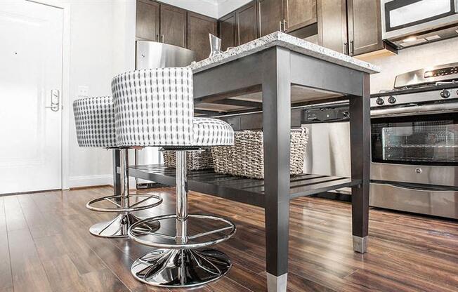 a kitchen with a counter top and a bunk bed