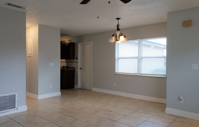 2 BR / 2 BA Condo with Attached Garage and Yard