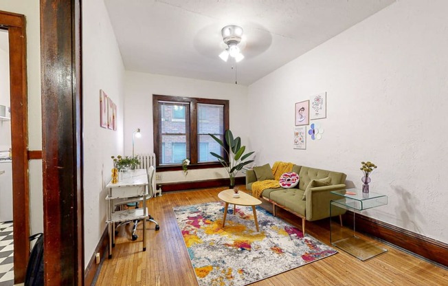 a living room with a couch and a table