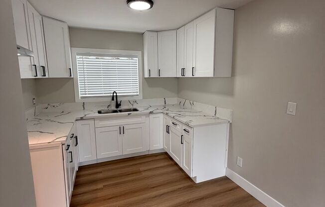 1245 W. 39th Pl.