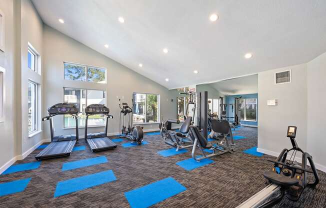 the preserve at ballantyne commons fitness room with exercise equipment and windows