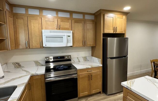 Beautifully Renovated 2 Bedroom Condo - Partially Furnished