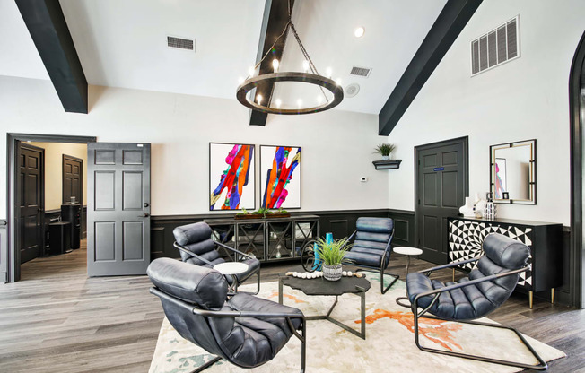 a living room filled with furniture and a large window