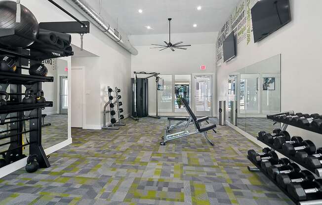 Community Fitness Center with Equipment at Overlook Apartments located in Salt Lake City, UT.