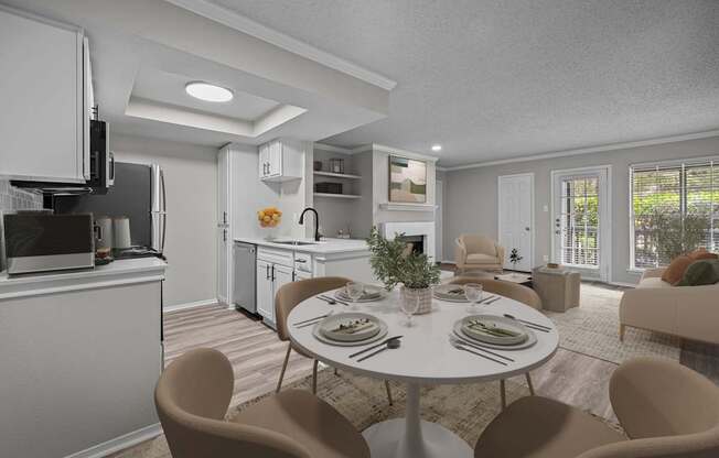 A modern kitchen with a dining table set for two.