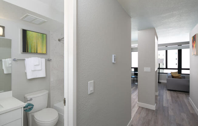 a bathroom with a toilet and a sink