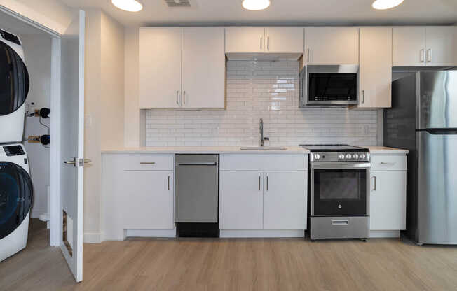 Kitchen with In-home Washer and Dryer