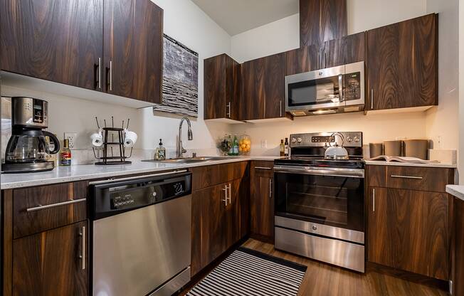 Kitchen showing appliances and sink