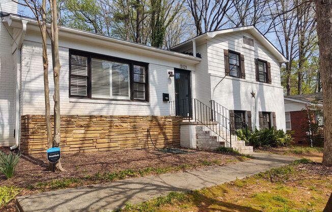 Beautifully renovated brick tri-level home located in the popular Amity Gardens!