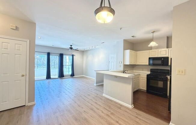 Beautiful 2bd 1bth private patio-level condo in New Town with a peaceful wooded view!
