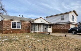 Spacious Split-Level 4-Bedroom Home with Tons of Potential in South OKC!