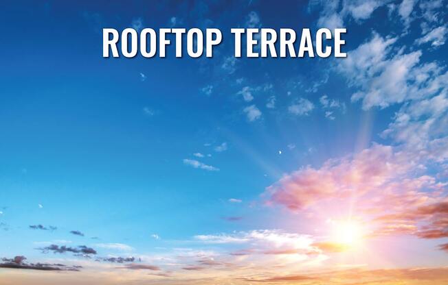 A beautiful sunset with the text "ROOFTOP TERRACE" overlaid on the image.