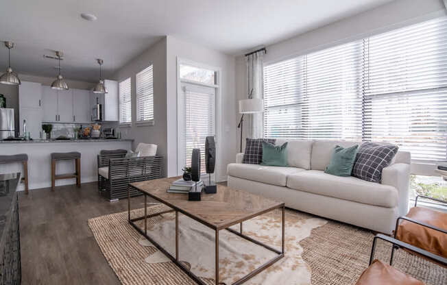 a living room with a couch and a coffee table