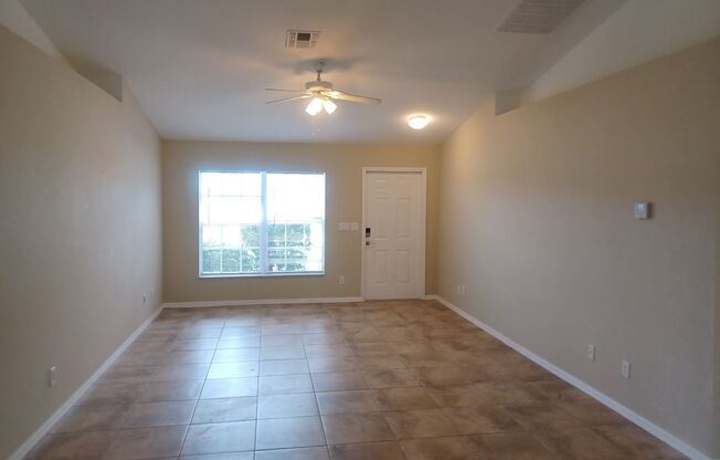 PRICE REDUCTION: Freshly Painted: 3 bedroom 2 bathroom single family home with screened lanai
