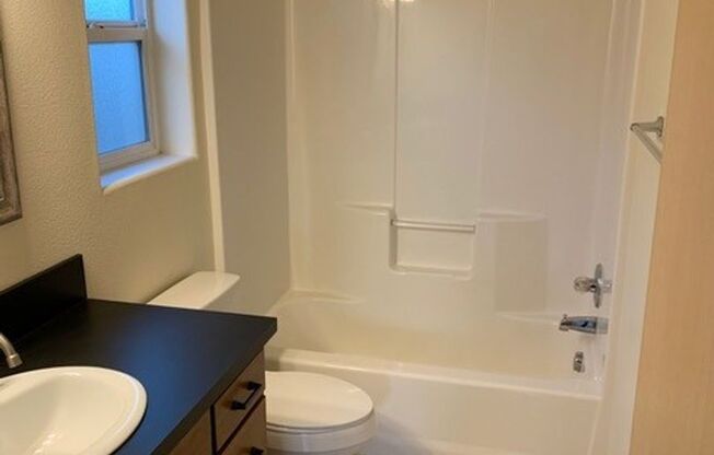 Charming SE Portland 3-Bedroom Home with Granite Kitchen, Gas Range, Garage & Private Yard
