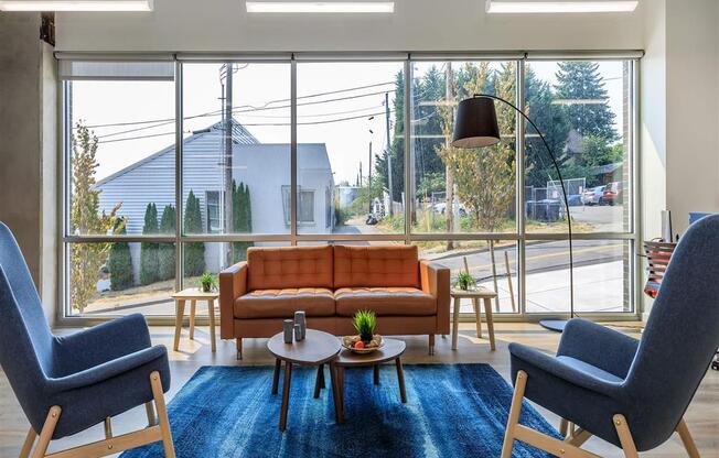 a living room with a couch and two chairs at Jefferson Yards, Washington, 98402