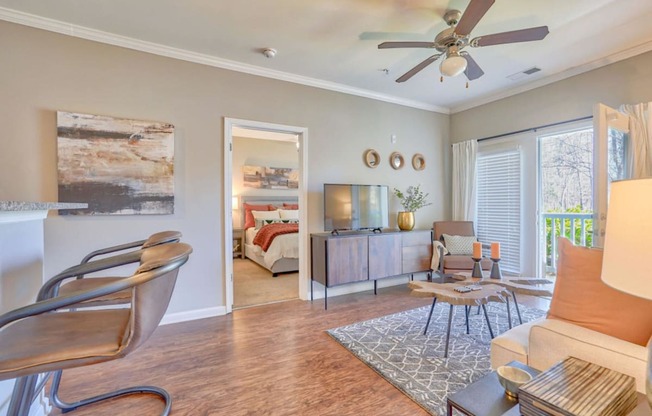 a living room with a couch and a ceiling fan at Cypress River, South Carolina, 29456