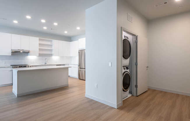 Den with In-home Washer and Dryer
