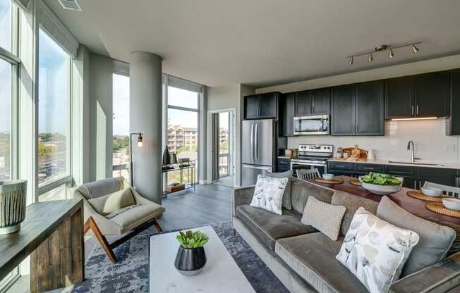 3 BR Apartments in Mount Prospect IL - 20 West - Living Room with Wood-Style Flooring and Floor-to-Ceiling Windows