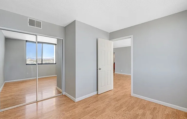 Enjoy resort-style living in this 2 Bed 2 Bath Condo with Stunning Strip Views in the Wimbledon Community in Downtown Las Vegas!
