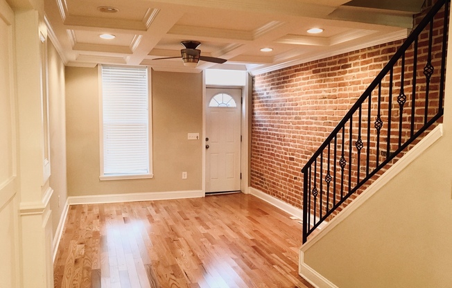 Charming 2 Bedroom/3 Bathroom Townhome w/ Den and In-Unit Laundry in Locust Point, MD! - Parking Pad!