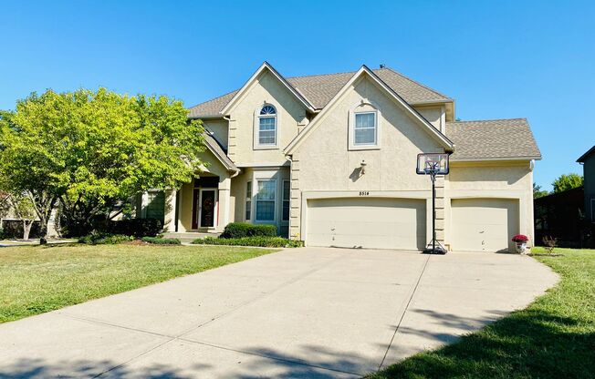 {8514}  Village of Kensington + Finished Basement + 3 Car Garage + Community Pool + Blue Valley Schools!