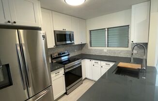 Available now - 2 bedroom / 2 bath / 1 covered parking stall in the Waipuna Building in Waikiki
