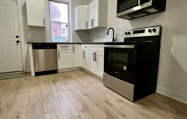 Newly Renovated 3-Bedroom Townhouse in Elmwood Park! Available mid-May! PHA VOUCHERS ACCEPTED!