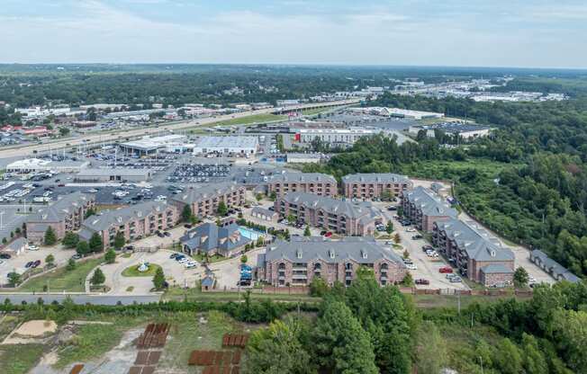 an aerial view of a parking lot in a city