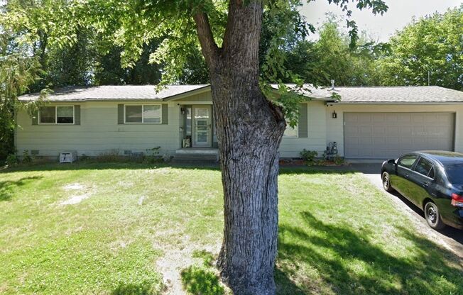 Two Bedroom, One Bathroom House with Fenced Yard and Double Car Garage