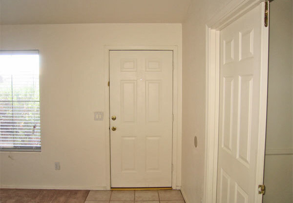 Great 4 bedroom 2 bathroom single level home near freeway and shopping!