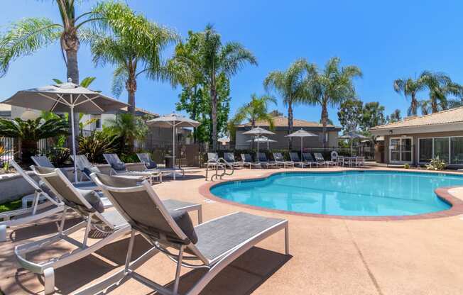 Waterstone at Murrieta Apartments in Murrieta, California Pool with Lounge Chairs