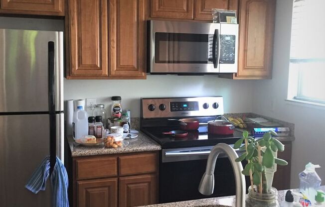 11744 SW Boones Bend Drive ~ Beautiful Loaded Townhome