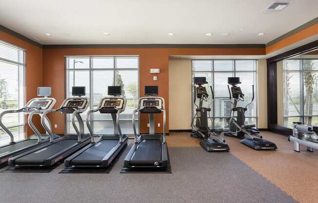 Bank of cardio equipment in fitness center  at LandonHouse in Lake Nona