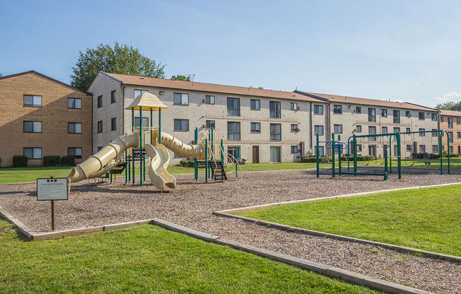 Playground structure with woodchip path at Rose Hill Apartments, Virginia, 22310