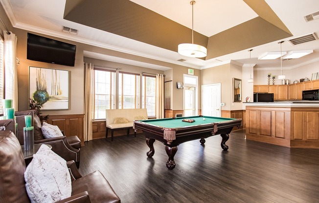 Pool table and serving area in clubhouse at Fieldstone Farm apartments in Odenton MD