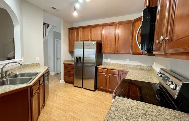Updated Townhome with Garage & Screened in Porch