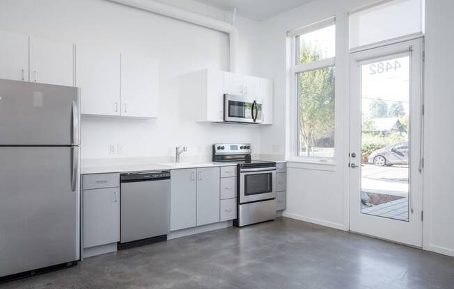The Lenox | Kitchen Area with Grey Cabinets